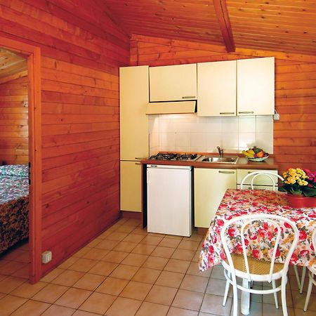 Villaggio Camping Spiaggia Del Riso Вилласимиус Номер фото
